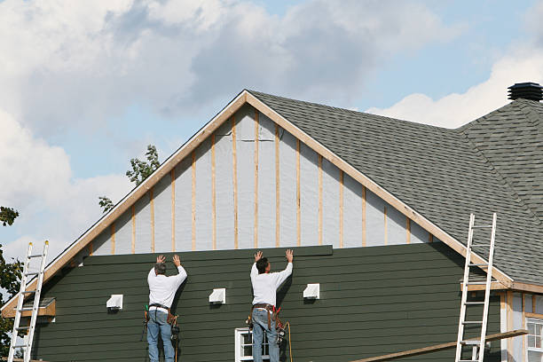 Professional Siding technician working in Abell, MD